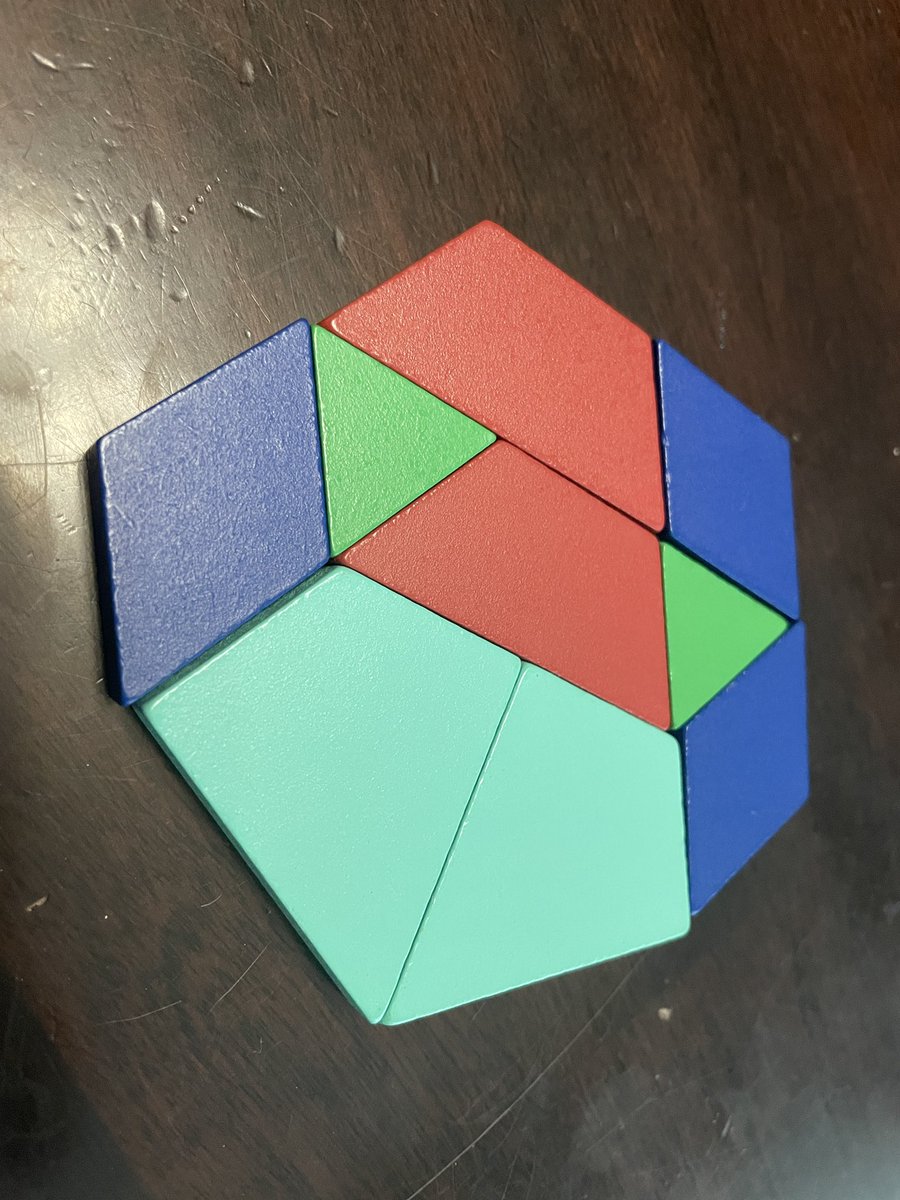 NMedina5's tweet photo. The now 6-year-old has a new toy & he loves them so much he wanted to play early this morning. He made a baby & a daddy bird and then found an interesting pattern that had SEVEN sides! We had to look up the name of that one. 😂 #21stCenturyPatternBlocks #MTBoS @Trianglemancsd https://t.co/fB2mf3XZnP