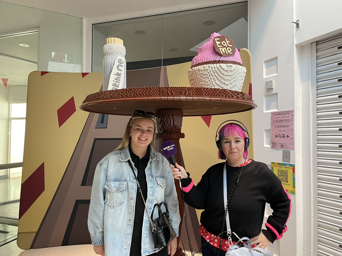 TVRadioPeg's tweet photo. I’m on the #aliceinbrickland summer trail in #harrogate town centre this morn for @BBCYork 

Sara Ferguson, Chair @BidHarrogate channeling her inner Alice, &amp;  Bethany Allen &amp; me under the EatMeDrinkMe table. Honest we haven’t drunk the potion…. 

@spanswicktweets @joncowap https://t.co/lXDOpdWmfm