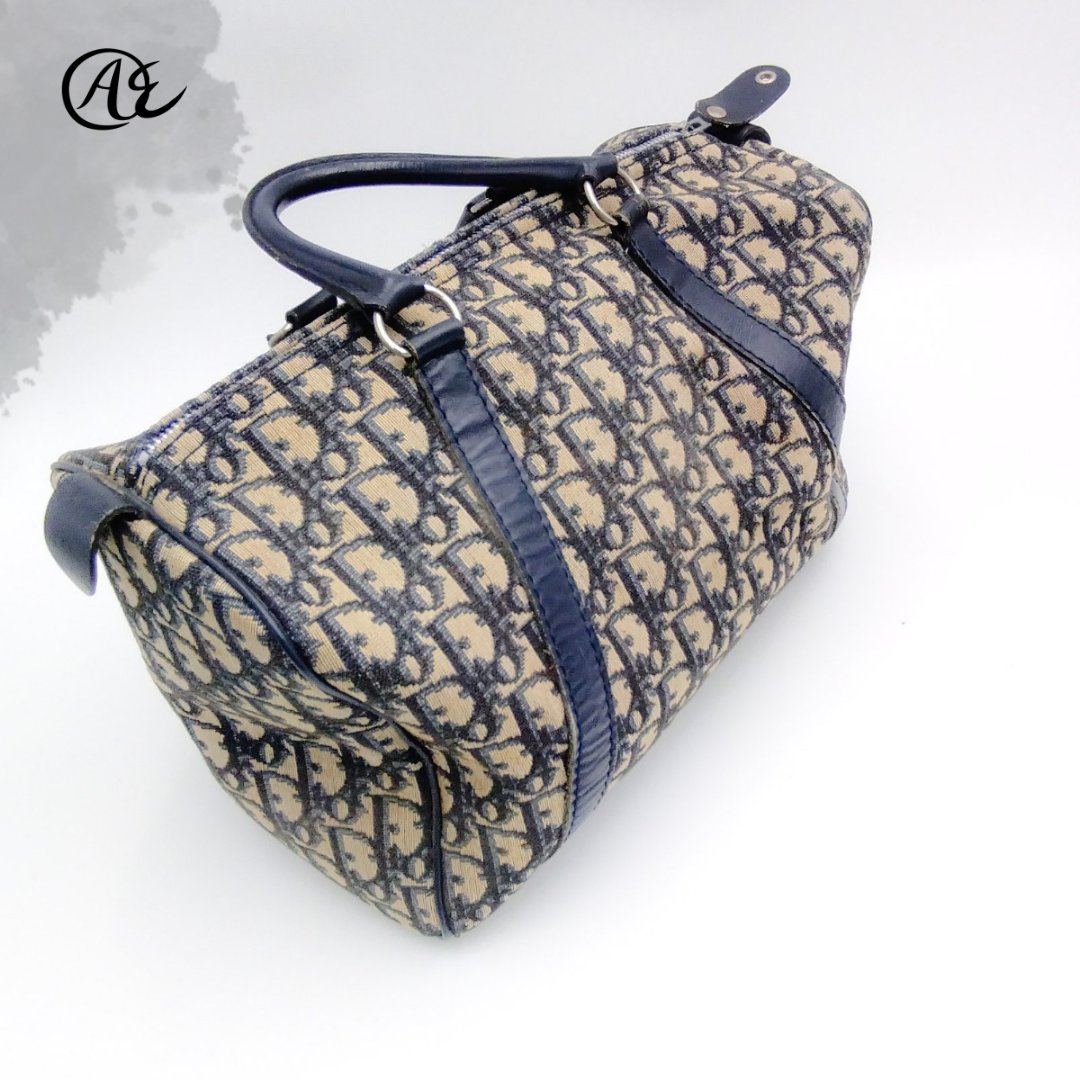 auth_experts's tweet photo. The Christian Dior Navy Blue Canvas Boston bag coming to you in a medium size and it is big enough for all that we need to carry. 

What is your favorite Boston Bag? Let us know in the comment section below 👇 https://t.co/d4sP85IufJ