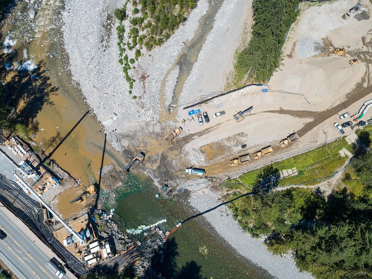 This photo shows 2 Trans Mountain excavators digging in the middle of the Coquihalla River during SALMON spawning season. #stopTMX #salmon #oilandgas