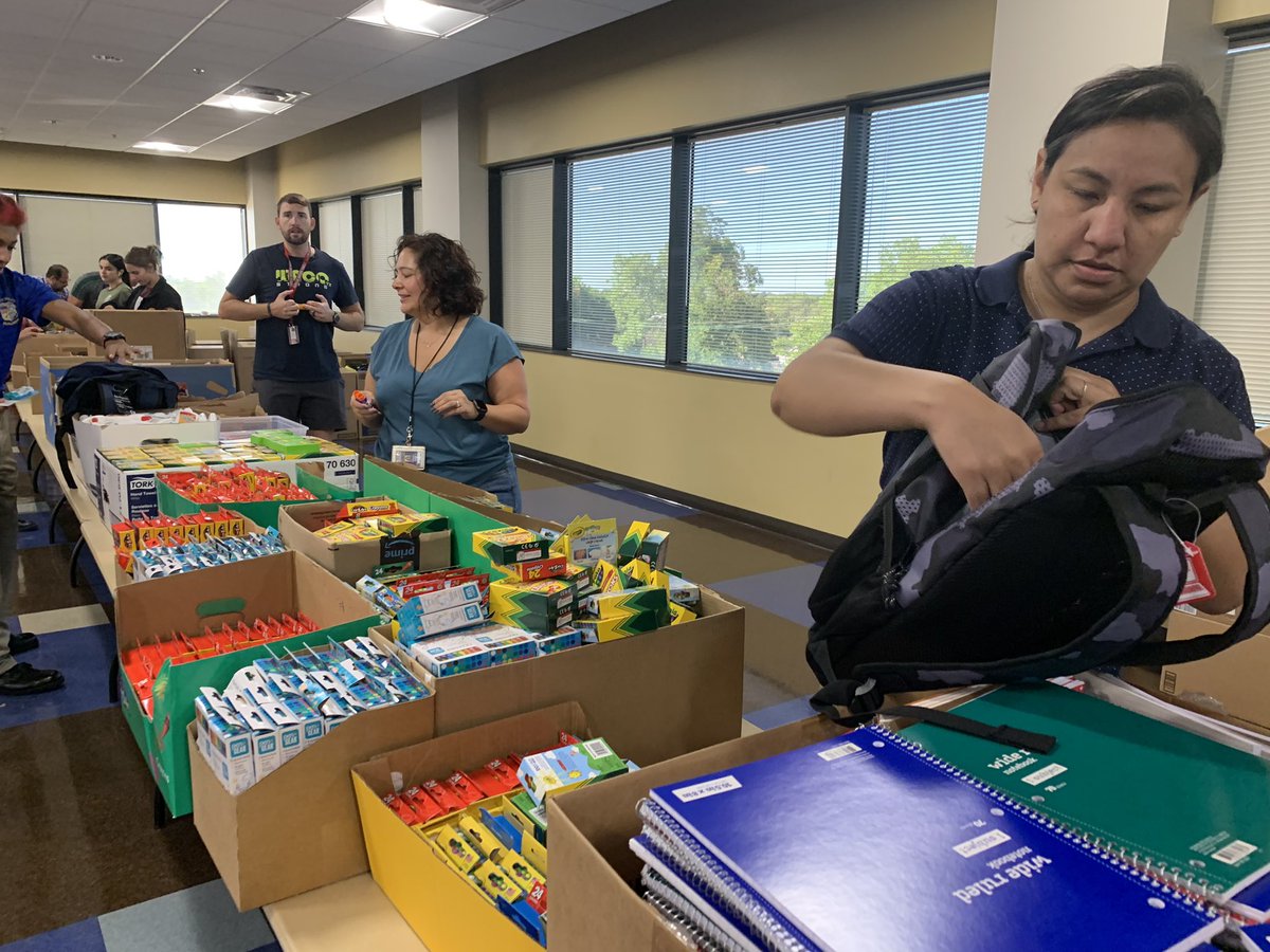 WacoPolice's tweet photo. We are busy stuffing our hundreds of backpacks for this Saturday’s Back to School Bash!! Join us from 8 a.m. to 3 p.m. at the BASE @ Extraco for some free school supplies, a back pack and more! https://t.co/2D1L4MWJWw