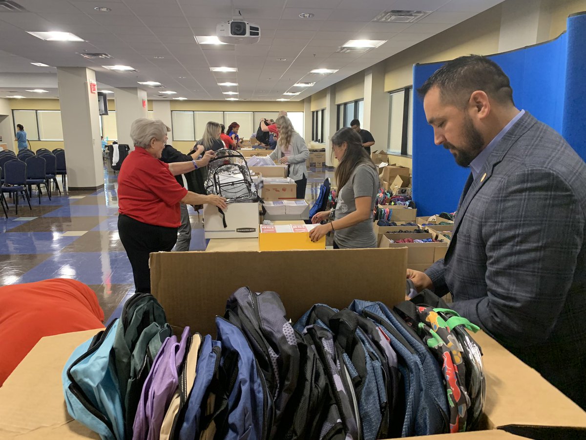 WacoPolice's tweet photo. We are busy stuffing our hundreds of backpacks for this Saturday’s Back to School Bash!! Join us from 8 a.m. to 3 p.m. at the BASE @ Extraco for some free school supplies, a back pack and more! https://t.co/2D1L4MWJWw