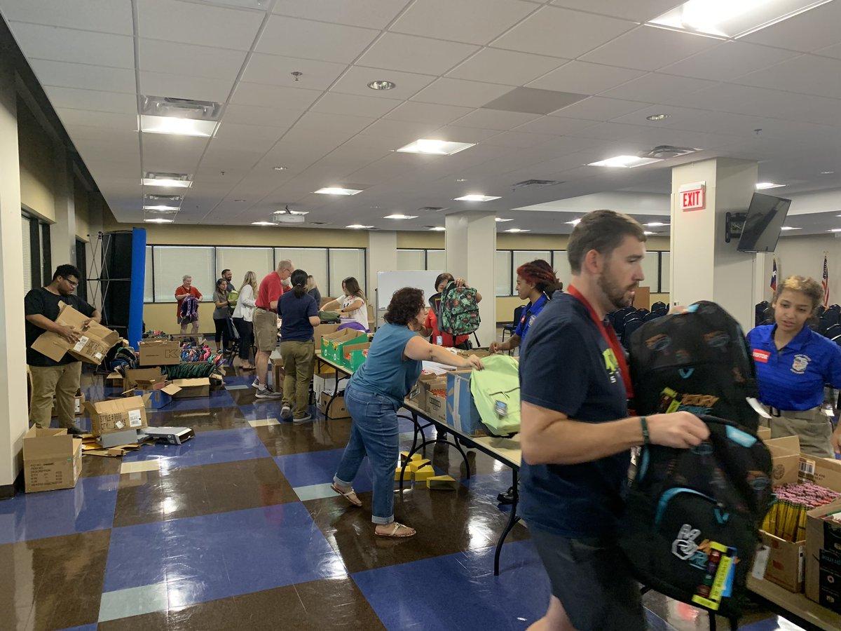 WacoPolice's tweet photo. We are busy stuffing our hundreds of backpacks for this Saturday’s Back to School Bash!! Join us from 8 a.m. to 3 p.m. at the BASE @ Extraco for some free school supplies, a back pack and more! https://t.co/2D1L4MWJWw