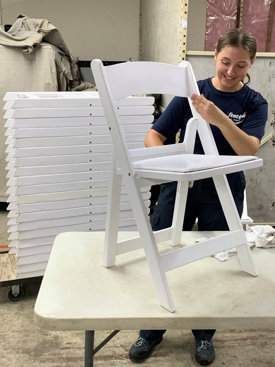 festivaltent's tweet photo. Someone is pretty happy to be on chair cleaning duty!  Keep up the awesome work Paige Pavic!!  #smilewhileyouwork #happydays #yqg https://t.co/WEh35SGlkl