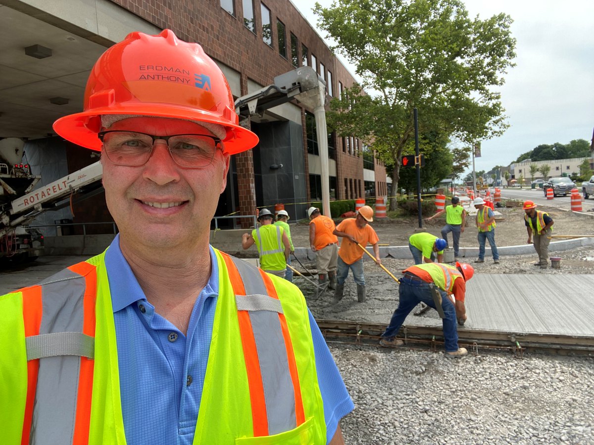 ErdmanAnthony's tweet photo. Today’s #ProjectSelfie features @ErdmanAnthony's Bill McCormick, PE, at a concrete pour at a project site on East Main Street in Rochester, New York. “Any day out in the field is fun,” he said. #ErdmanAnthony #TheCommunityThatBuildsCommunities https://t.co/PmalWSp3Jb