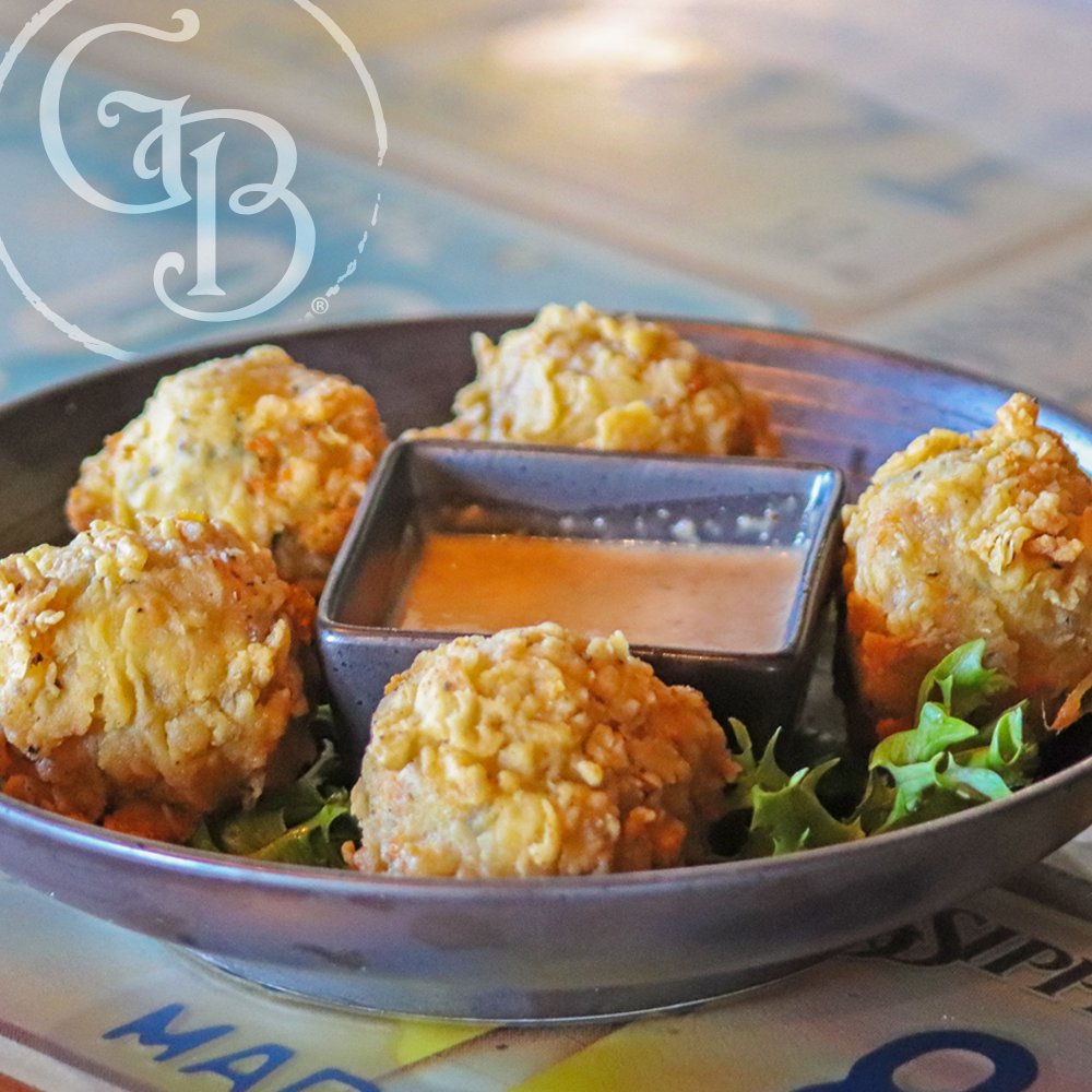 💥Turnip Green Bites💥 turnip greens, applewood smoked bacon, and cheese deep fried and served with our honey remoulade. If you haven't tried these yet, you're missing out! 

#GeorgiaBlue #LiveLifeBlue #turnipgreenbites