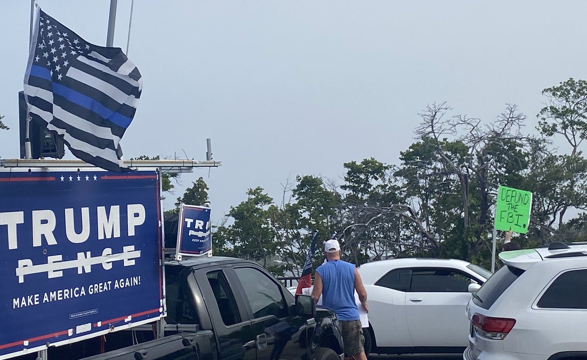 C_A_Heath's tweet photo. Crowds packing in on the bridge leading to Mar-a-Lago https://t.co/dTlV9OpMVx