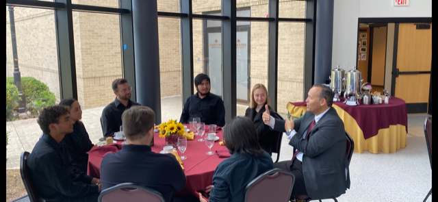 txstmusic's tweet photo. Another great photo from commencement! During the lunch between commencement ceremonies, President Damphousse sat with members of the brass ensemble and had a great conversation! https://t.co/R7A3A6fEKG
