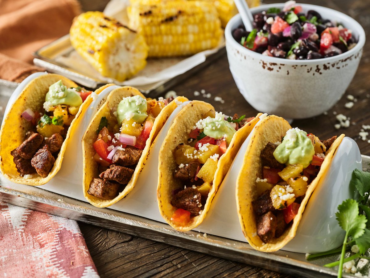 Beef's tweet photo. NEW RECIPE ALERT! 🌮 
Introducing the hottest recipe of the summer! Ancho Chile Spiced Street Tacos with Pineapple Salsa and Jalapeno Crema.

Spice up your summer with this dish -> https://t.co/EOeQrUcYaP

#BeefFarmersAndRanchers #BeefUpSummer https://t.co/qZHLRcQ6I3
