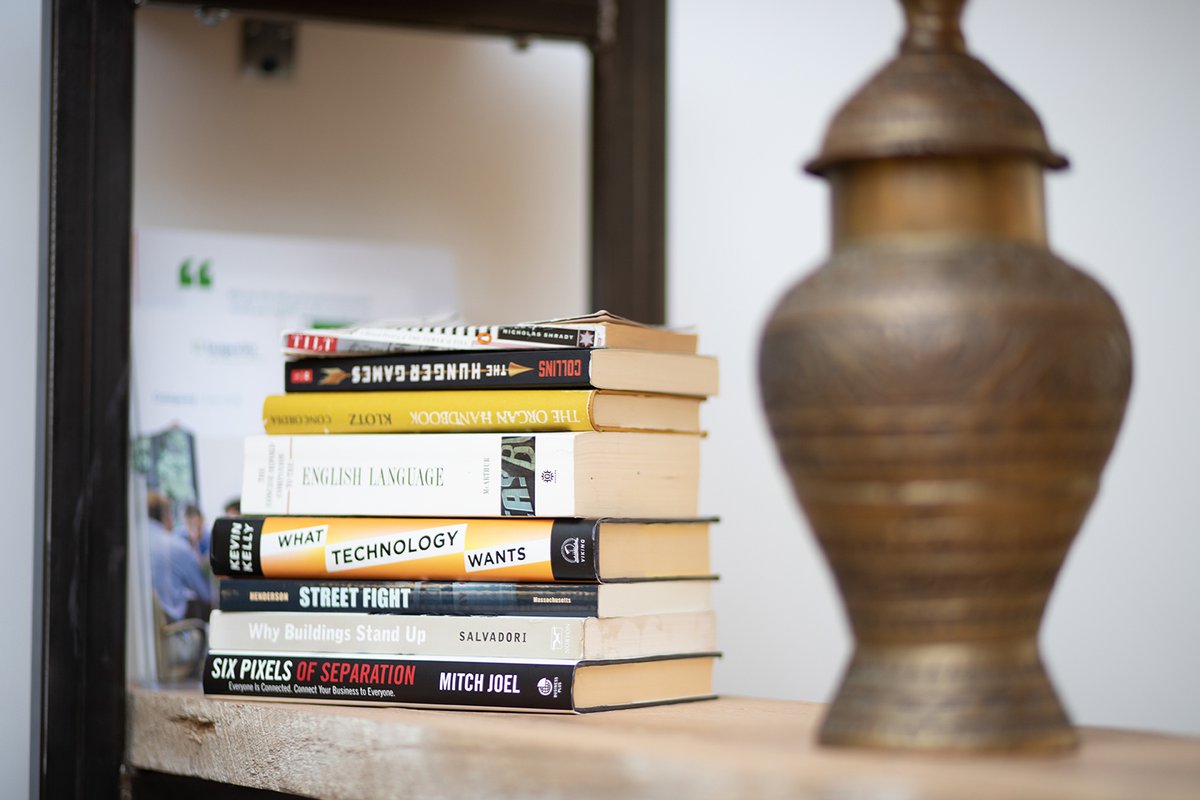TheMillDE's tweet photo. Fun fact, while it has been added to over the years by members (which we LOVE), most of the books on our shelves are from our founder's personal collection! #changethewayyouwork #themillde #coworking #inwilm #bookloversday https://t.co/HcUUJT0HoH