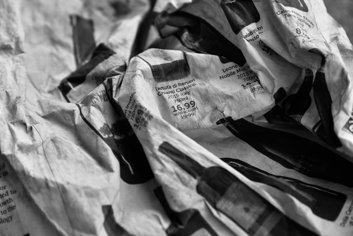 ZachZer0's tweet photo. #old #paper #wrinkled #crumpled #newspaper #advertising #wine #photography #blackandwhite #art #zero #litter #Texas https://t.co/uX6P1U93qL