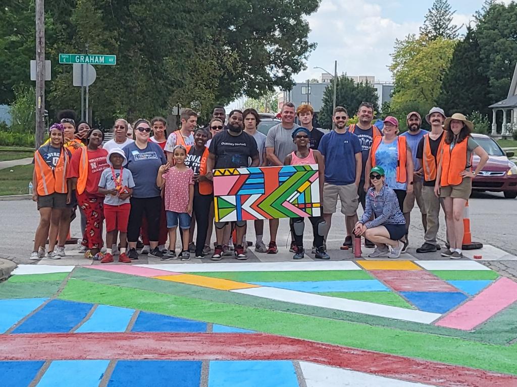 IPSABE88's tweet photo. Great things are happening at ABE. The Community Heights Neighborhood Organization used a grant to paint a mural to improve driving conditions while our scholars walk to and from school. @Erob624 #TeamESRocks #provingwhatspossible https://t.co/fgPpiy2RPM