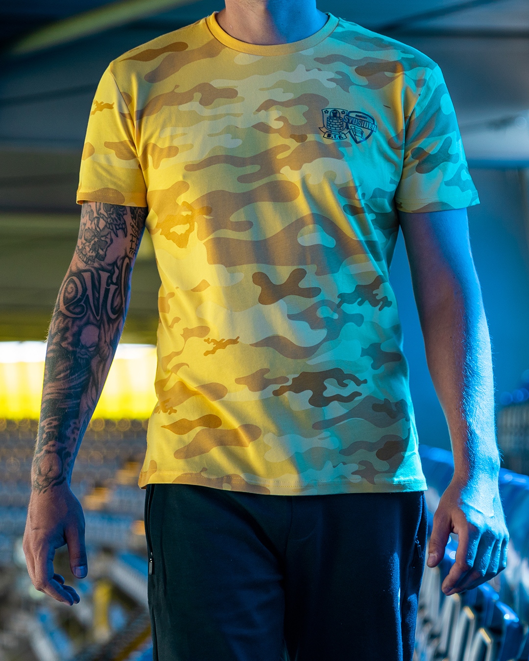 Brøndby on Twitter: "Nu kan du købe den populære camo t-shirt, som er i samarbejde med de aktive fans. T-shirten vil blive båret fansene i udebaneafsnittet i Basel i