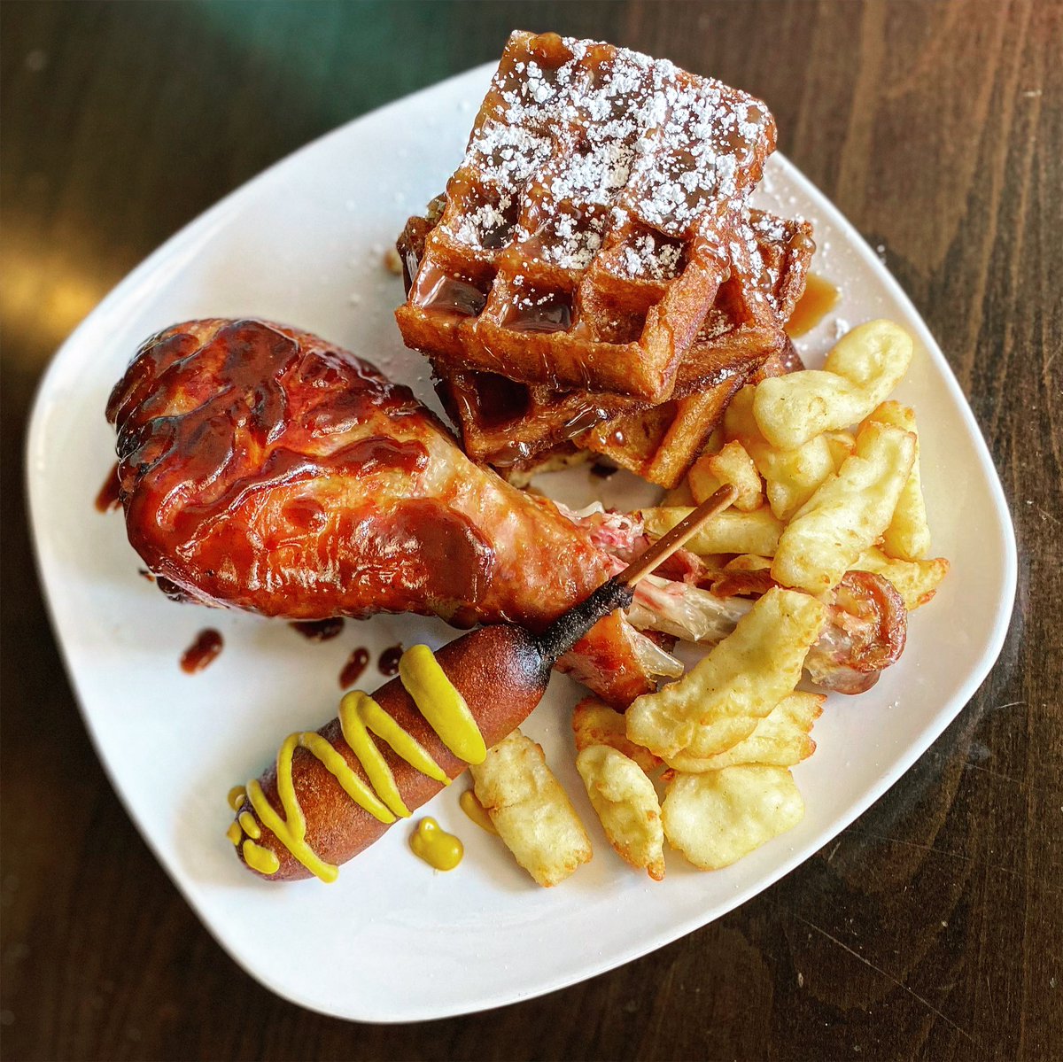 This week the M.C. Waffle is bringing the State Fair to you! It features funnel cake waffles topped with caramel and powdered sugar, paired with cheese curds, a corn dog and a bbq turkey leg!
#eggsandjam #waffles #brunch #breakfast #weeklyfeature #iowastatefair #ISFFindYourFun