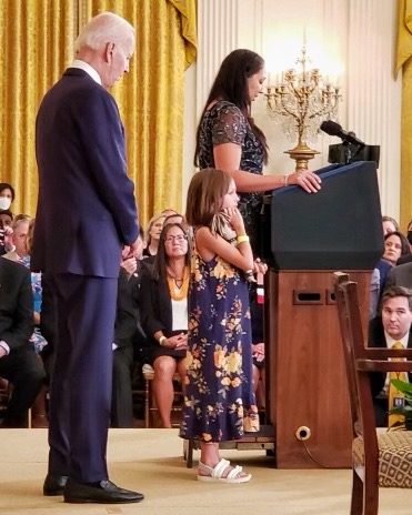 PVA1946's tweet photo. Today, @POTUS signed The Sergeant First Class Heath Robinson Honoring Our Promise to Address Comprehensive Toxics Act (AKA #PACTAct) into law. Present was Danielle Robinson, Heath's widow, their child, PVA reps, and others who joined in #PushingAccessForward to #PassThePACTAct. https://t.co/M40J8wY3Yg