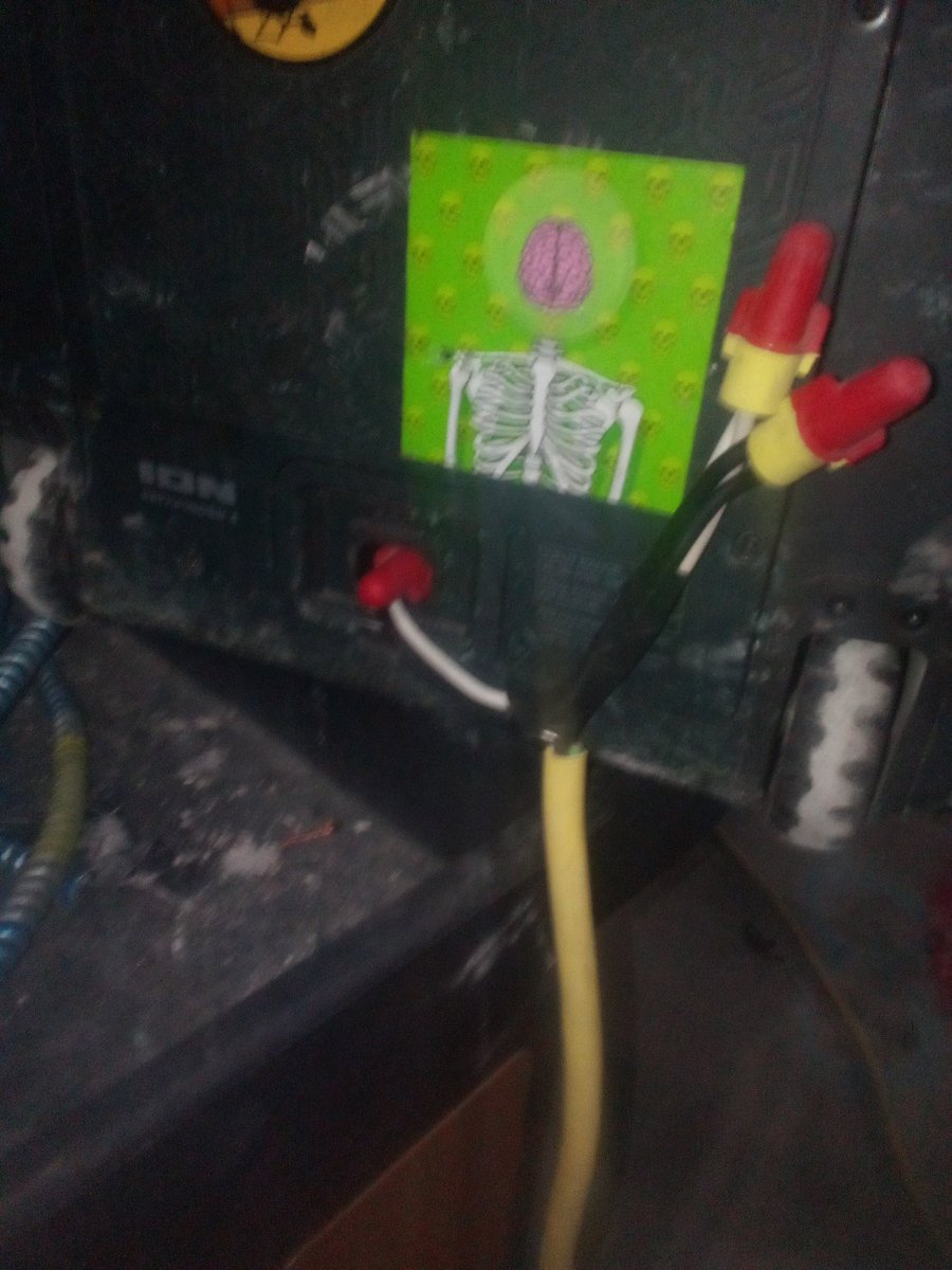 I left the cord to charge my speaker in Meggybooboo's car so I had to improvise a little. Do not try this at home.