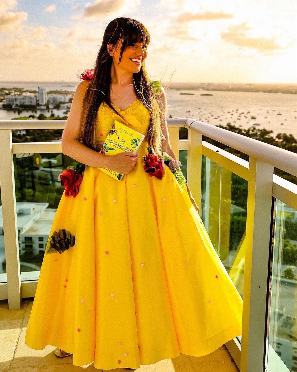 heyitscarlyrae's tweet photo. The UnHoneymooners Book Dress!💛🦜📖👗 

The cover of The Unhoneymooners by @ChristinaLauren is the inspiration behind this book dress from the amazing @JFkillsdarlings 🤩 From the flowers to the yellow color to the beautiful bow this book dress is another for books! #books https://t.co/mnA7BtSvGh