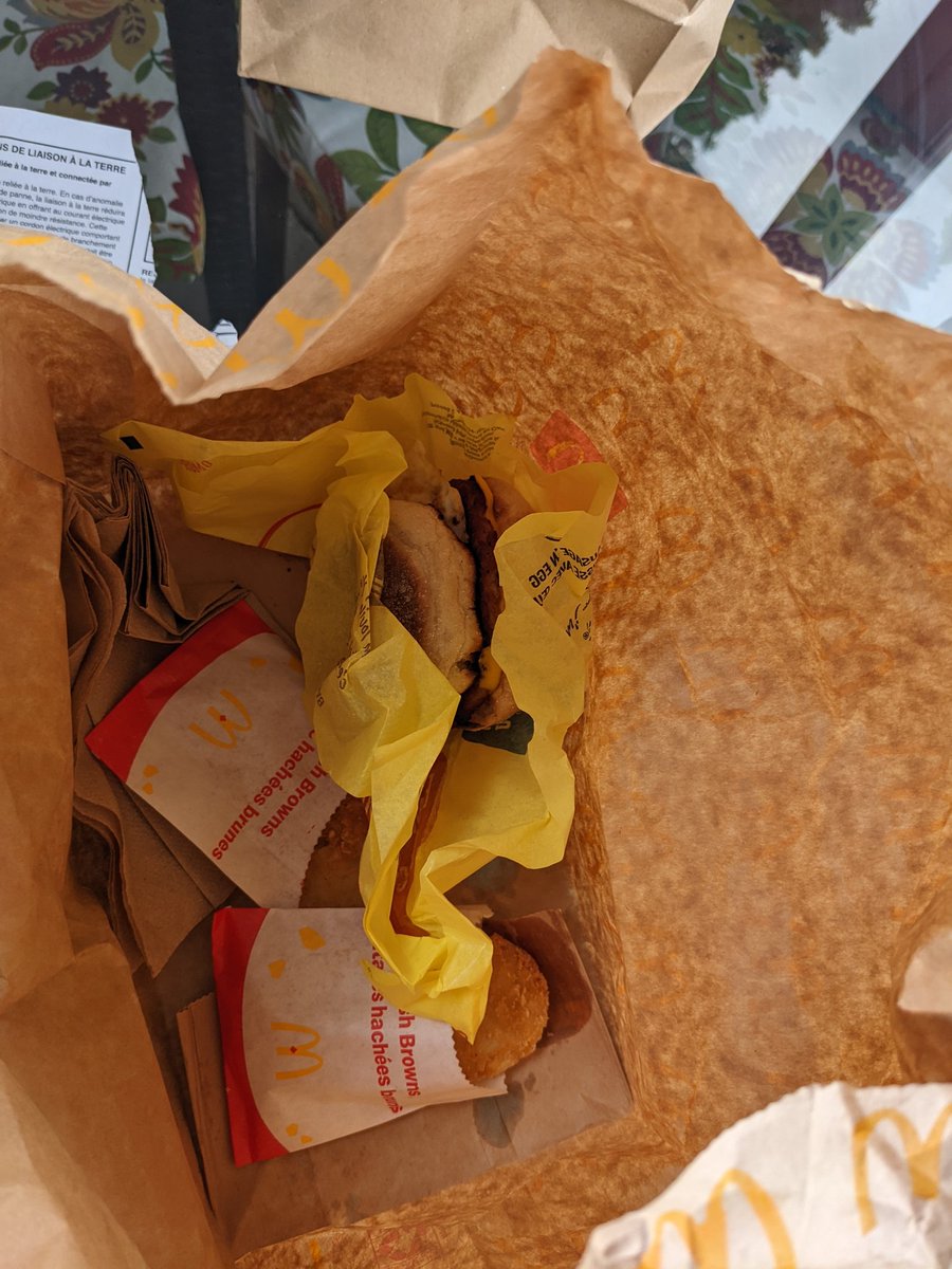 pgladwin's tweet photo. @McDonaldsCanada @McDonalds 

What would you do , if you received this bag within a sealed bag from UberEATS that contains an unwrapped sausage and egg McMuffin. Feels weird ,  like this was someone's wrong order then they put it in my delivery bag? Would you feel icky eating it? https://t.co/Cnpm5tpCsc