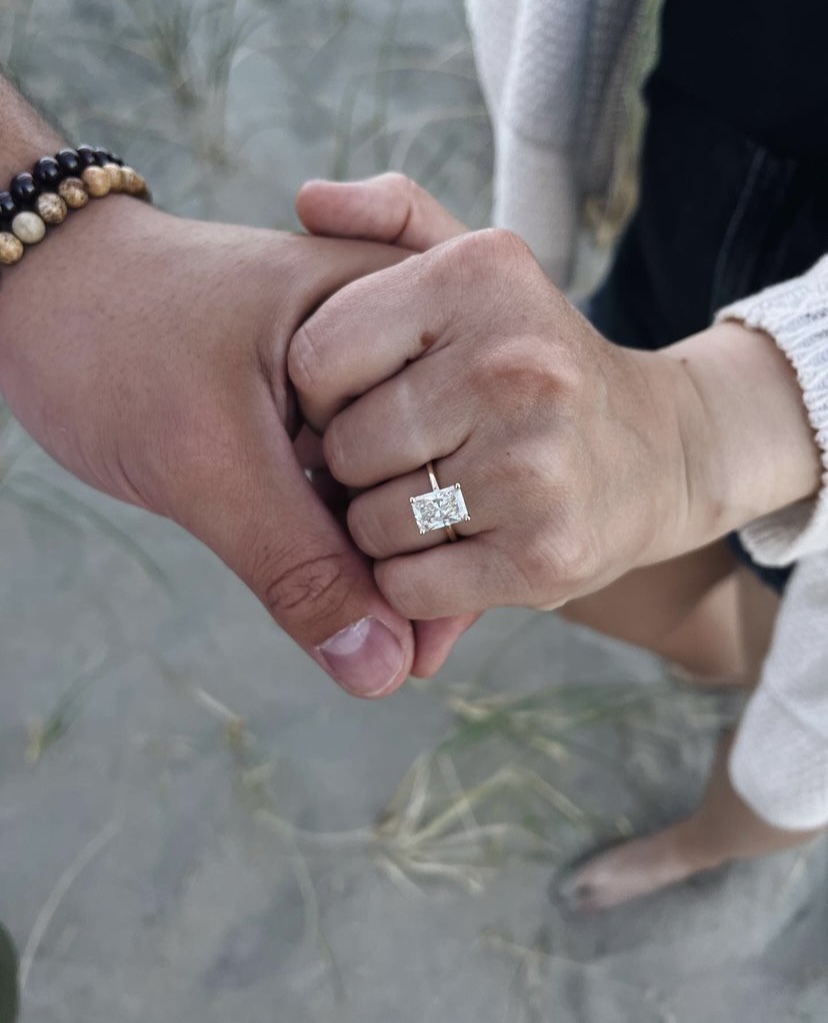 "On the day of the proposal we were taking pictures and he kneeled down. MiaDonna was so helpful in designing the ring for us! It was a JOY to work with you all!! I got my dream man and my dream ring!" - @lydiatomba⁠