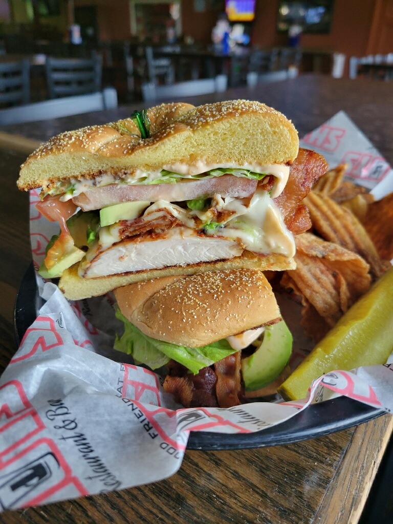 ShotsOnTheRiver's tweet photo. It’s lunch time at Shots on the River. Grab our $8 Grilled chicken with bacon, avocado, pepper jack cheese, lettuce, tomato, and Chipotle mayo on a kaiser bun. #shots #SOTR #shotsontheriver #shotslunchspecial https://t.co/nWOIJfrJk0