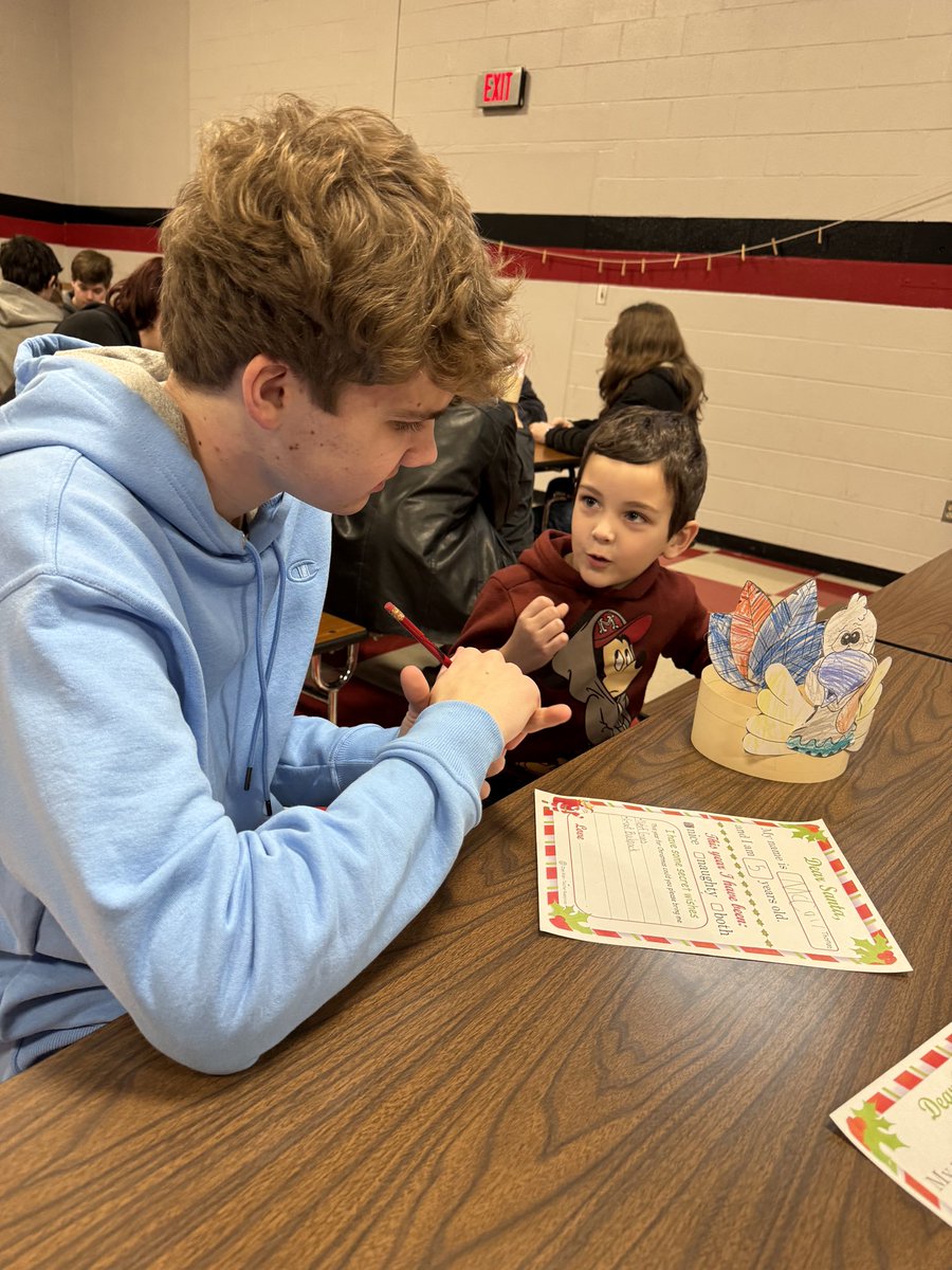 APCCHS's tweet photo. Prior to leaving on Thanksgiving Break, CCHS’s Class of 2024 made their 2nd trip to visit their CC kindergarten buddies.  The visit was full of stories, smiles, connections &amp; even a little glitter as ornaments were crafted &amp; letters to Santa were drafted!  #WeAreCC ❤️🖤❤️🖤 https://t.co/cH0mwyaUKh