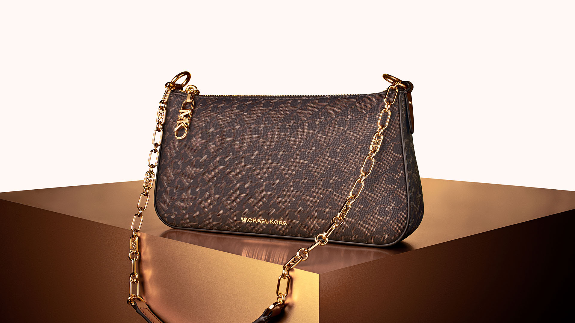 Michael Kors on X: Bold shoulder. The Empire Chain-Link pochette