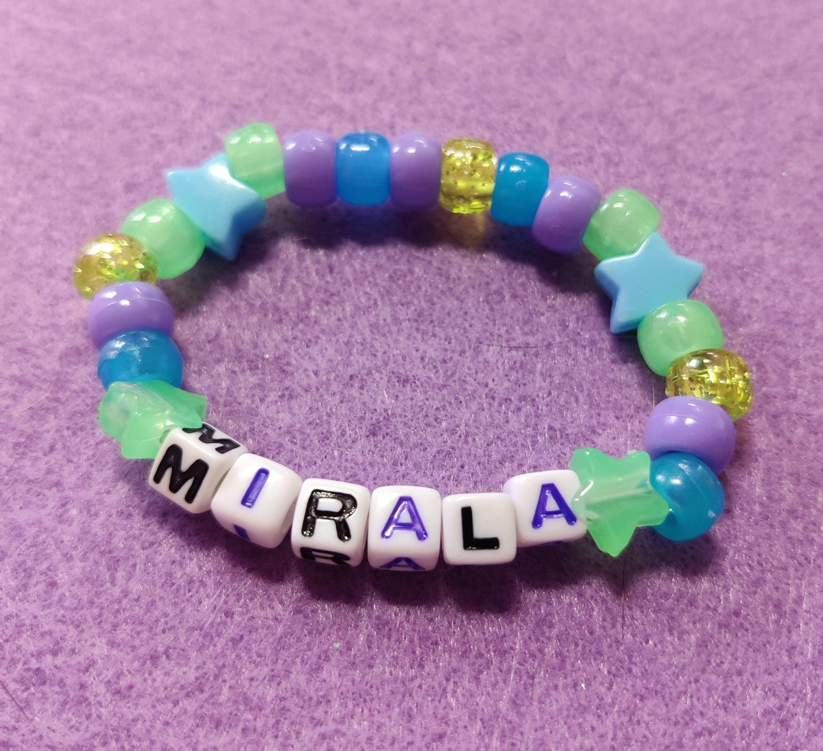 pandaparfaitart's tweet photo. Two custom bracelets finished recently 💖 I love making these sm, it's so fun to match colors &amp; patterns to sonas https://t.co/SLNKFDms76