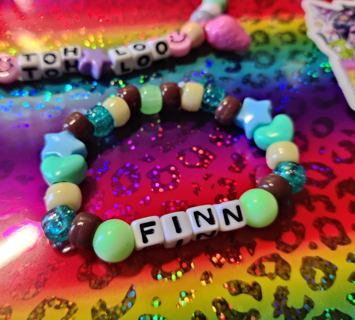 pandaparfaitart's tweet photo. Two custom bracelets finished recently 💖 I love making these sm, it's so fun to match colors &amp; patterns to sonas https://t.co/SLNKFDms76