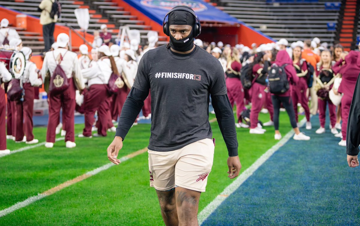 Florida State players are all warming up with the same shirt on. Simple message: #FinishFor13 247sports.com/college/florid…