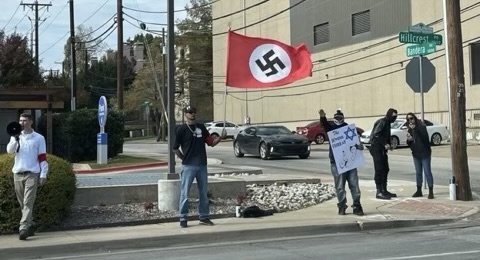 StopAntisemites's tweet photo. Dallas, TX - one of the males seen today holding up antisemitic signage & wearing a swastika armband in front of a Synagogue has been identified as Barry Young, 25, of Plano Texas.

Young appears to be member of the 'Goyim Defense Legue' (GDL) and operates on GAB under the screen name 'Baby Face'.