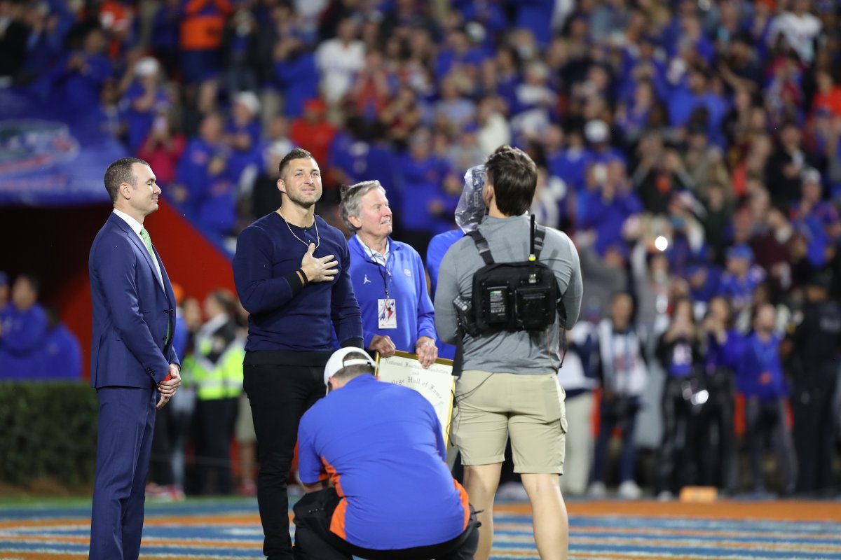 GatorsScott's tweet photo. A couple of #Gators Heisman statues come to life ... shot by @mallory_peak https://t.co/iYUmYNwLl4