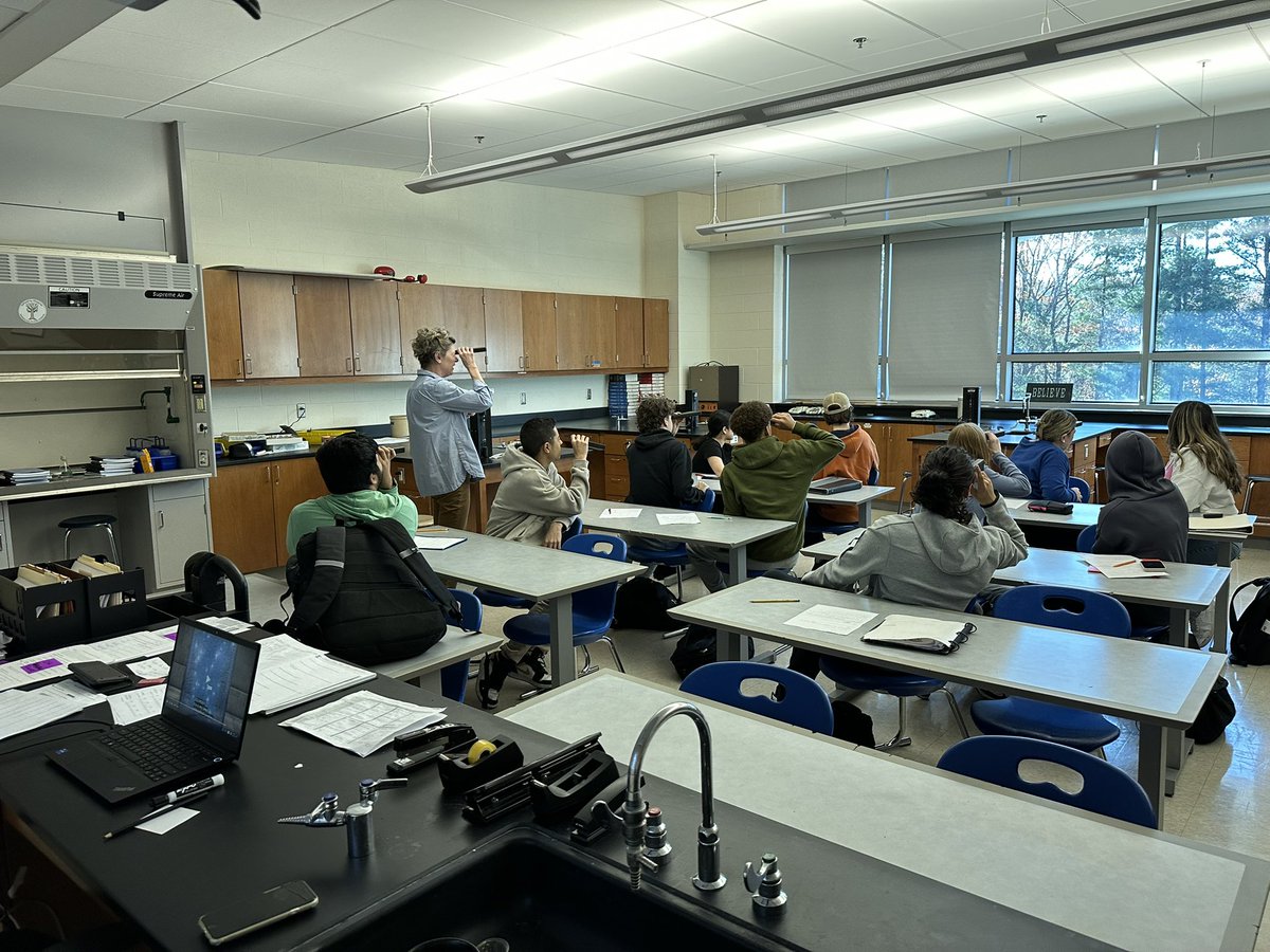 Mrs. O’Sullivan’s #chemistry students see evidence of the #quantum nature of electrons by using spectroscopes to observe bright-line spectra emitted by gas tubes of hydrogen, neon, krypton, argon and others #NewtownHS #science