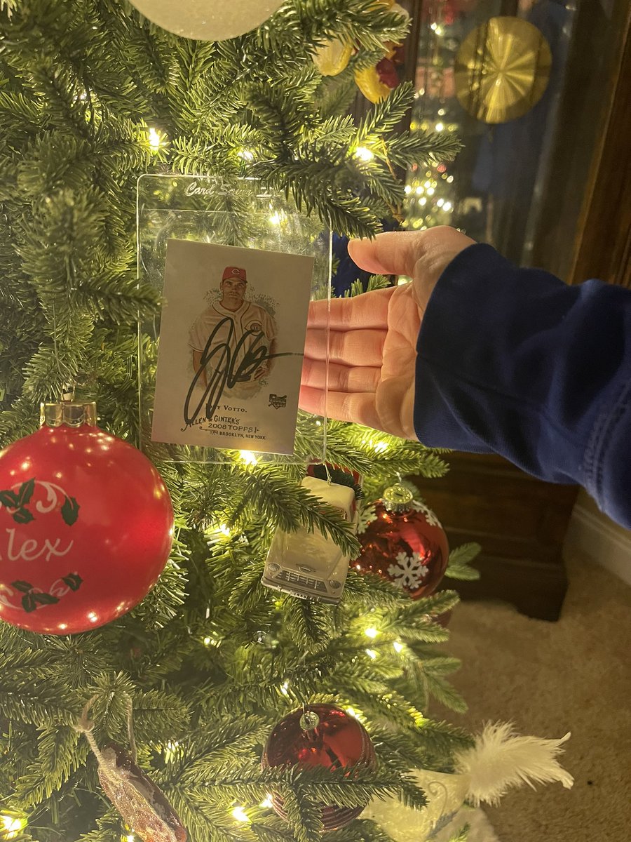 jamesh19d's tweet image. Putting up the tree and our favorite ornaments. My daughter’s favorite bus driver was kind enough to sign a 2008 A&amp;amp;G card for her when he was in Louisville earlier this year. You made it to the tree, Mr. Votto. Thanks for so many years as a Red!  @JoeyVotto