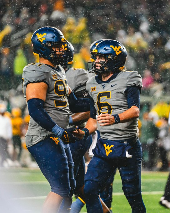rivalskeenan's tweet photo. #WVU QB Garrett Greene is the first player to throw for at least 265 yards with 2 touchdowns and rush for 100 yards and 2 touchdowns in one game. https://t.co/xIy9srb0O4