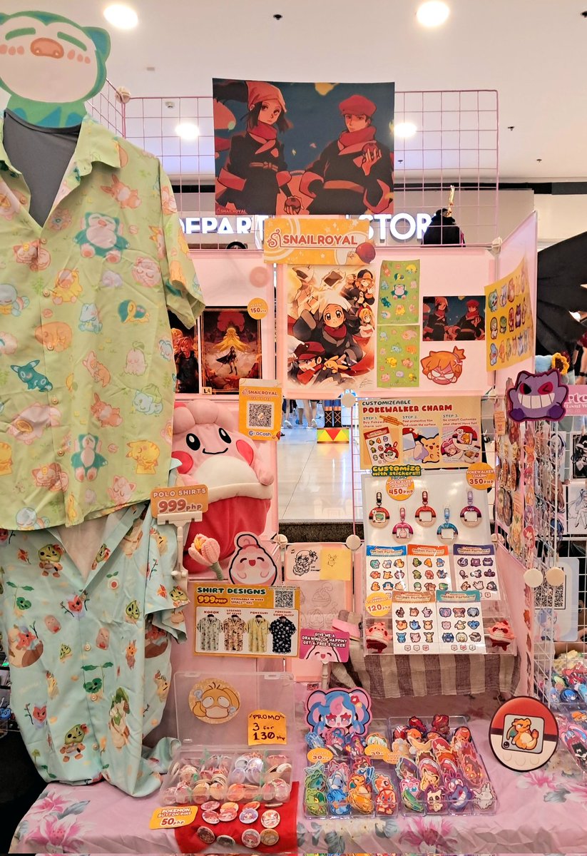 omg we're here at Pokecon day 2 !!!!!!   Our happiny corner has mASSIVELY GROWN!!!!!   thank you much!!! I still have some stickers left for the draw happiny trade >:)))))   Legends of Eevee shirts are also sold out!  my other shirts are still available! #PokeConPHMarketMarket