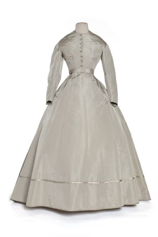 kateStrasdin's tweet image. The first frost has etched itself across the fields, draining colour from the landscape so that it is an eery shadow of itself in early morning light. This #1860s gown appears to have been touched with a frosted finger, like the Snow Queen, an icy, silky figure @madparisfr