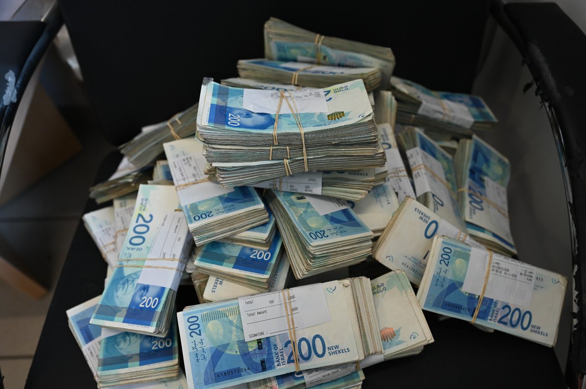 manniefabian's tweet photo. The Defense Ministry announces that during operations in the Gaza Strip, forces seized some NIS 5 million in cash, along with Iraqi dinar, Jordanian dinar, and US dollars, from Hamas strongholds and homes of operatives. The money will be forfeited for the state. https://t.co/IoYmBEYHSD