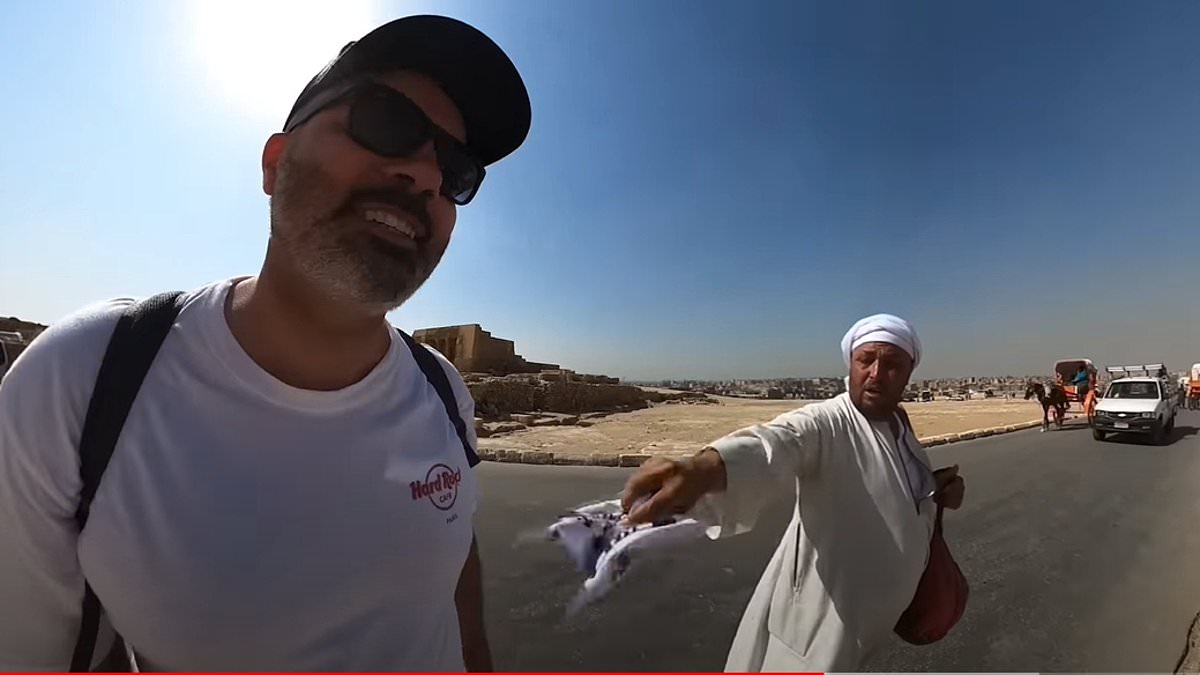 DailyMail's tweet photo. Traveller reveals the four main scams for solo tourists to watch out for at Egypt's pyramids, from the 'whistle hustle' to the 'free gift' con https://t.co/UCGT4k4TzN https://t.co/Gk8MxvMFSS