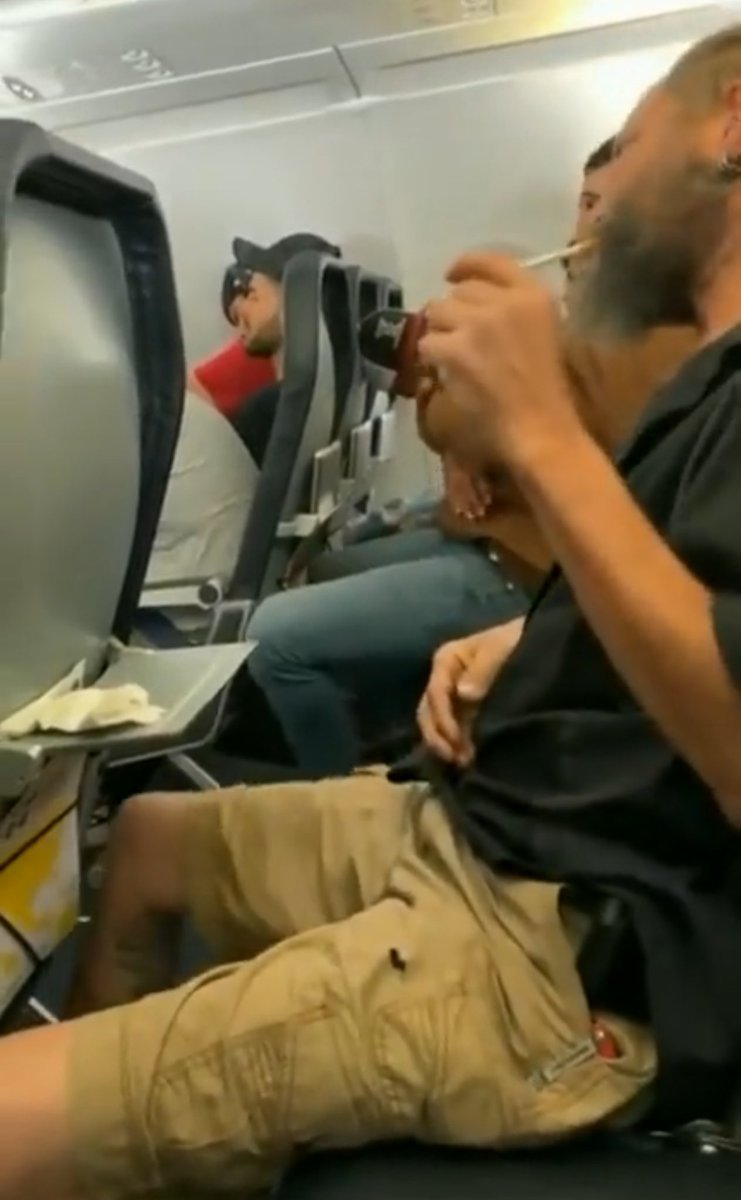 CRAZYVIDEO123's tweet photo. @crazyclipsonly Why is this guy smoking on the plane? https://t.co/S4EnjXdhAL