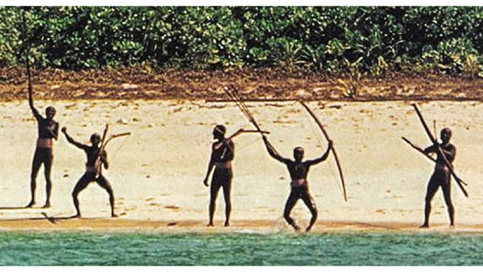 Rainmaker1973's tweet photo. These people lived on  North Sentinel Island for 60,000 years, maintaining an isolated existence on this landmass in the Indian Ocean, comparable in size to Manhattan. 

This small community, numbering between 80 to 150 individuals, has subsisted through hunting and gathering, a lifestyle reminiscent of the Stone Age. Notably, agriculture finds no place in their practices.

The island's isolation has been a shield against external contact, as attempts to engage with the Sentinalese have consistently been met with fierce hostility. Historical accounts reveal a pattern of encounters that underscore the steadfast determination of this isolated community to preserve their autonomy.

In 1771, some East India Company's ships glimpsed lights on the shores of North Sentinel Island but refrained from further investigation. Subsequent interactions with the outside world paint a vivid picture of the Sentinalese's unwavering resistance. In 1867, an Indian merchant ship, forced to land on the island due to harsh monsoons, faced a barrage of arrows from the islanders after three days. The crew's defense with basic weapons lasted until the Royal Navy intervened.

The year 1880 marked a disturbing episode when British forces returned to find a deserted village. In an ill-fated attempt to breach their isolation, six Sentinalese individuals were kidnapped. However, exposure to the outside world proved calamitous for them as they succumbed to illness. Another tragic incident occurred in 1896 when an escaped convict reached the island, meeting a gruesome end with arrows and a slit throat.

The most recent and perhaps the most widely publicized interaction occurred in 2018 when an American Christian missionary sought to convert the Sentinalese. Despite warning shots and clear signs of aggression from two armed islanders, the missionary persisted in approaching, expressing love and religious beliefs. The encounter ended tragically with the missionary's death by arrows, his body left unrecovered on the island's beach.
