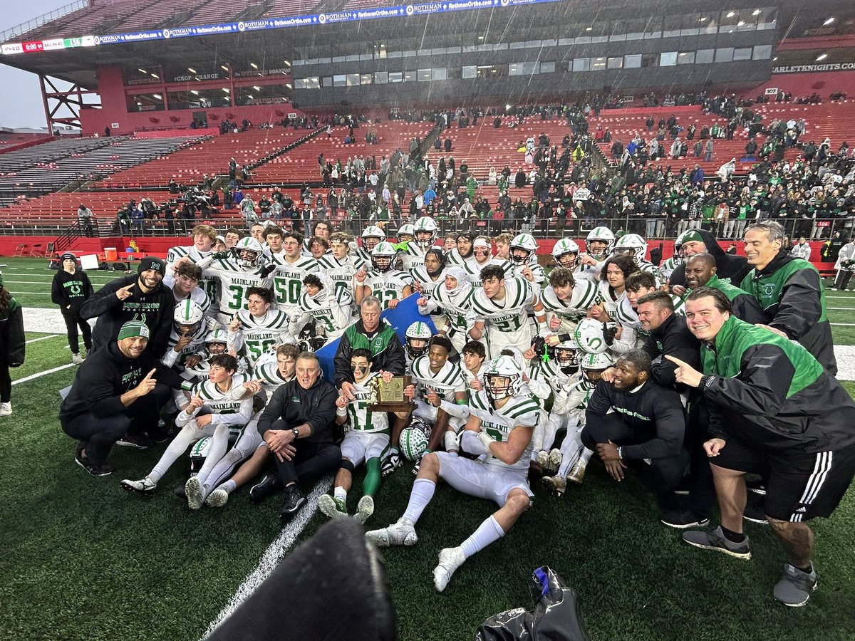 The champs with their trophy <a href="/MainlandRegHS/">Mainland Regional HS</a> <a href="/CorralCrazies/">Corral Crazies</a> <a href="/SJGridironGang/">Gridiron Gang</a>