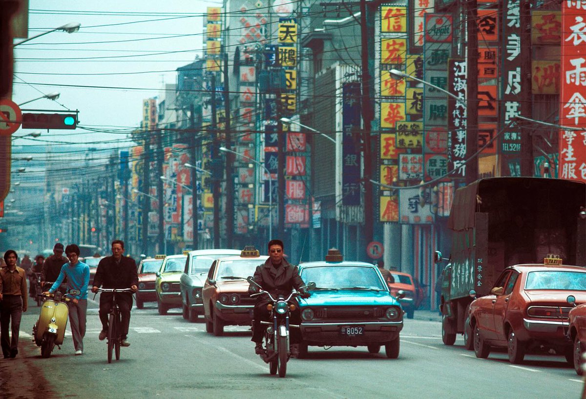 gregforaday's tweet photo. Taiwan scenes, 1976-1996.

First visit was on Dec 31, 1976. Arriving from Seoul. Stayed a week and then on to Hong Kong and Bangkok.

I’ve never made a book of my Taiwan pictures but other titles available via link in bio.

https://t.co/fcCHtVXXRf

1. Taipei, 1977.
2. Songshan Airport, 1996.
3. Taipei, 1977.
4. Taxi driver, Taipei, 1976.

#taiwan #taipei #kaoshiung #slidefilm #1970s #1990s #inthestreet #streetlife #freechina #roc #1977 #greggirard