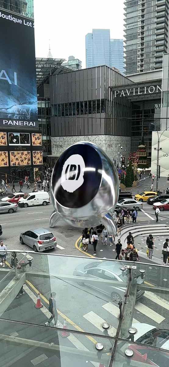 WeiChiew's tweet photo. A (B)apetaverse capsule has touched down at the heart of bukit bintang Crossing, signaling an unfolding fashion event.
@ehyong @yuens1n @zoyee 
#BAPEVOLUTION #BEVOARContest @bapetaverse #LFG #WAGMI https://t.co/RYiyTJXEzk