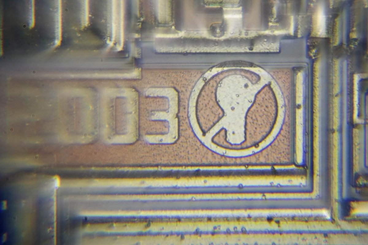 IR2520D is an adaptive ballast control ic coming from a CFL light bulb.
As you can see, this integrated circuit likes to play Pac-Man, and for some reason he hates conventional light bulbs.