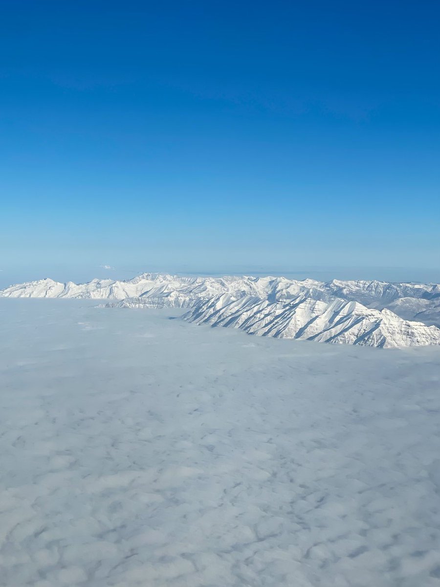 The high Wasatch above the clouds and developing inversion.
