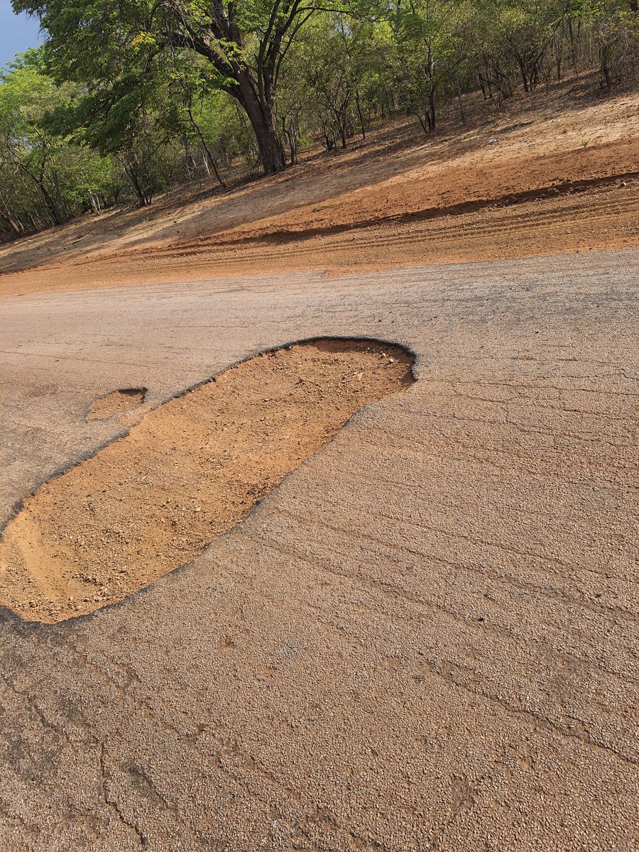 So I drove on the Bulawayo - Vic Falls highway yesterday and wh you see on these pics is generally what you come across for very long stretches. Surely we can do better than this. Those are gullies on the road to one of the wonders of the world! 

<a href="/MhonaFelix/">Felix Tapiwa Mhona</a>