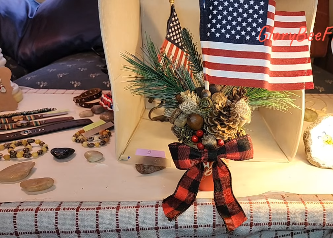 realConaldRump's tweet photo. No bids on bracelet #1 and #2, so we've moved on to the foraged pinecone sculptures which seems to have snagged a granny #FreedomCorner #successstory #salespro #happybeef https://t.co/glBbYh1p3E