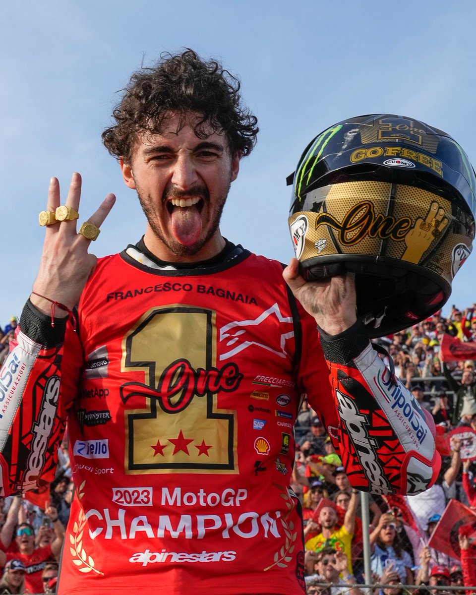 MotoGP's tweet photo. He did it, he defended the number #1, retained the crown and made history by taking back-to-back #MotoGP titles! 🏆

Congrats, @PeccoBagnaia! 👏

#BACK2BACKgnaia 🏆🏆 https://t.co/UXtKwwXulS
