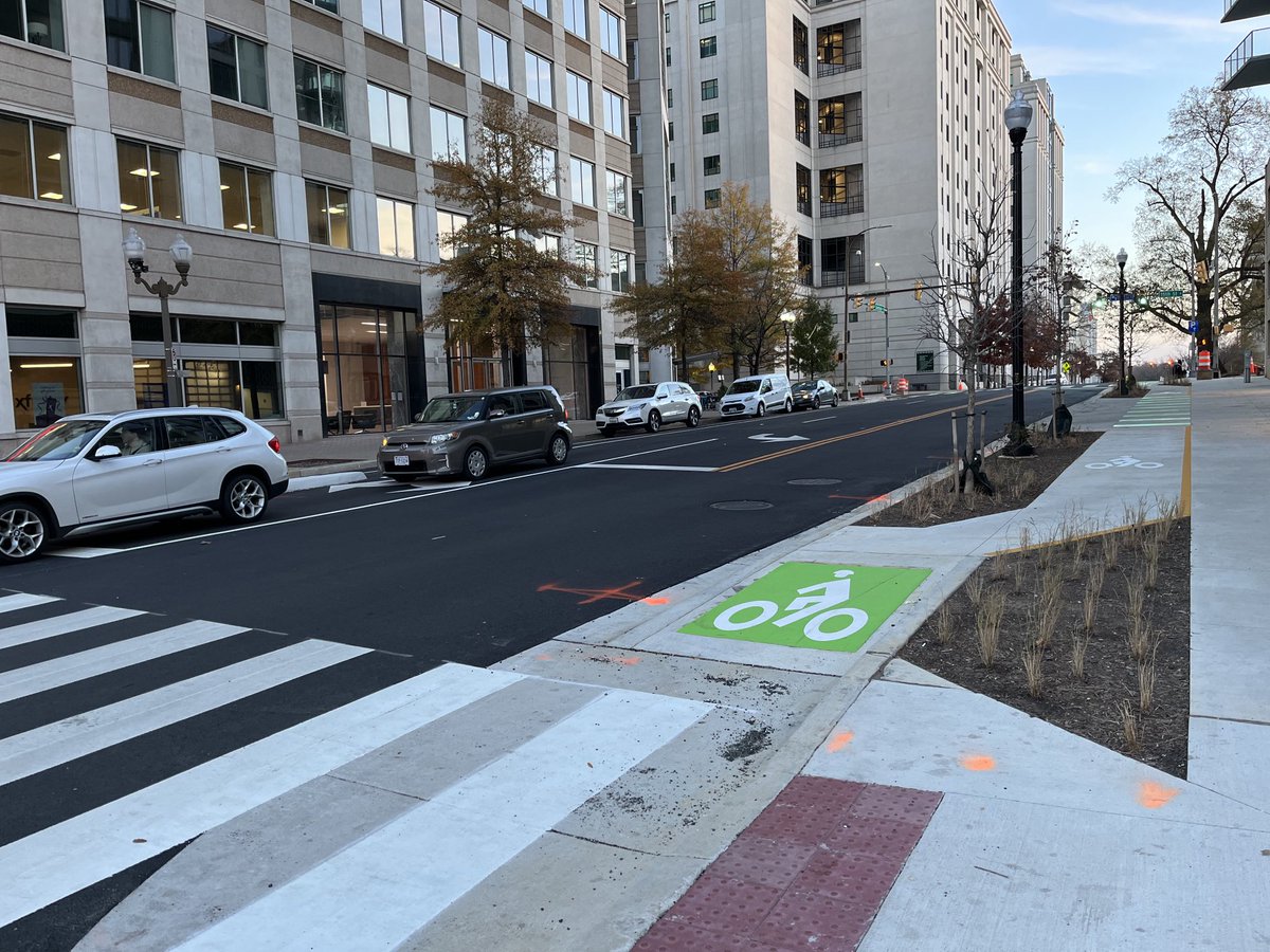 Wash_cycle's tweet photo. New protected intersection at Clarendon and Courthouse in Arlington. https://t.co/Si2G0HvDpc