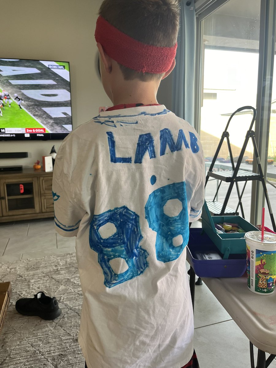 TGFleming116's tweet photo. son saw those Madden Thanksgiving patches and put his own Super Bowl stamp on a shirt he drew 😆 homemade premonition jersey let’s gooo!!   @_CeeDeeThree  @dallascowboys https://t.co/spbZdU4fKL